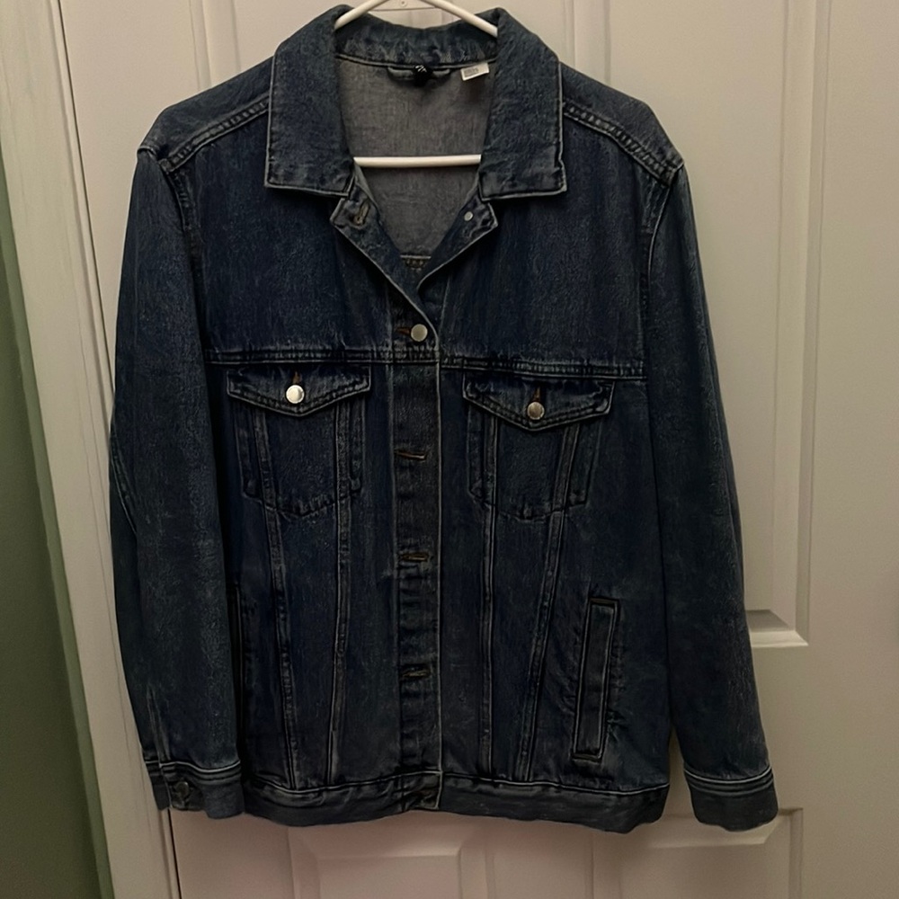 Denim jacket in a size 14 from H and M. Very good quality.